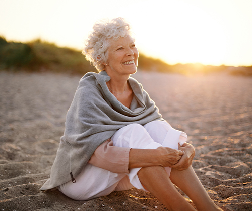 mature senior woman on beach annuity basics lifelong financial solutions