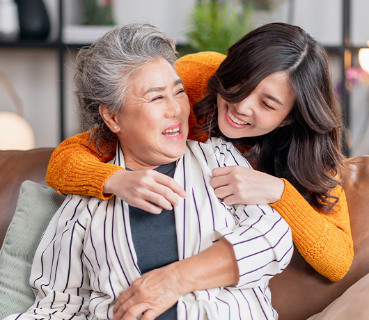 mother daughter hugs taxes on retirement income lifelong financial solutions