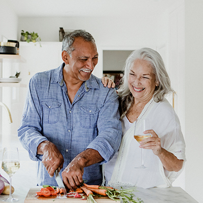 senior couple in kitchen happy annuity basics lifelong financial solutions