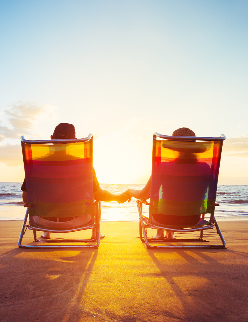 seniors lounging on beach chairs fixed index annuity rates lifelong financial solutions